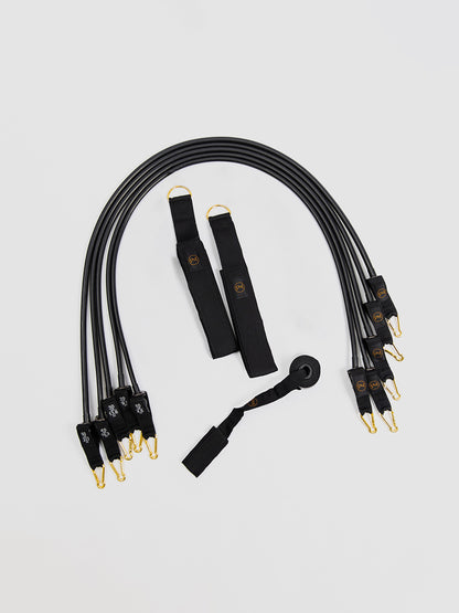 Set of black Pilates Mini resistance bands.