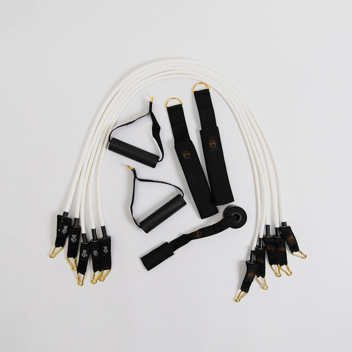 Set of white Pilates Mini resistance bands.