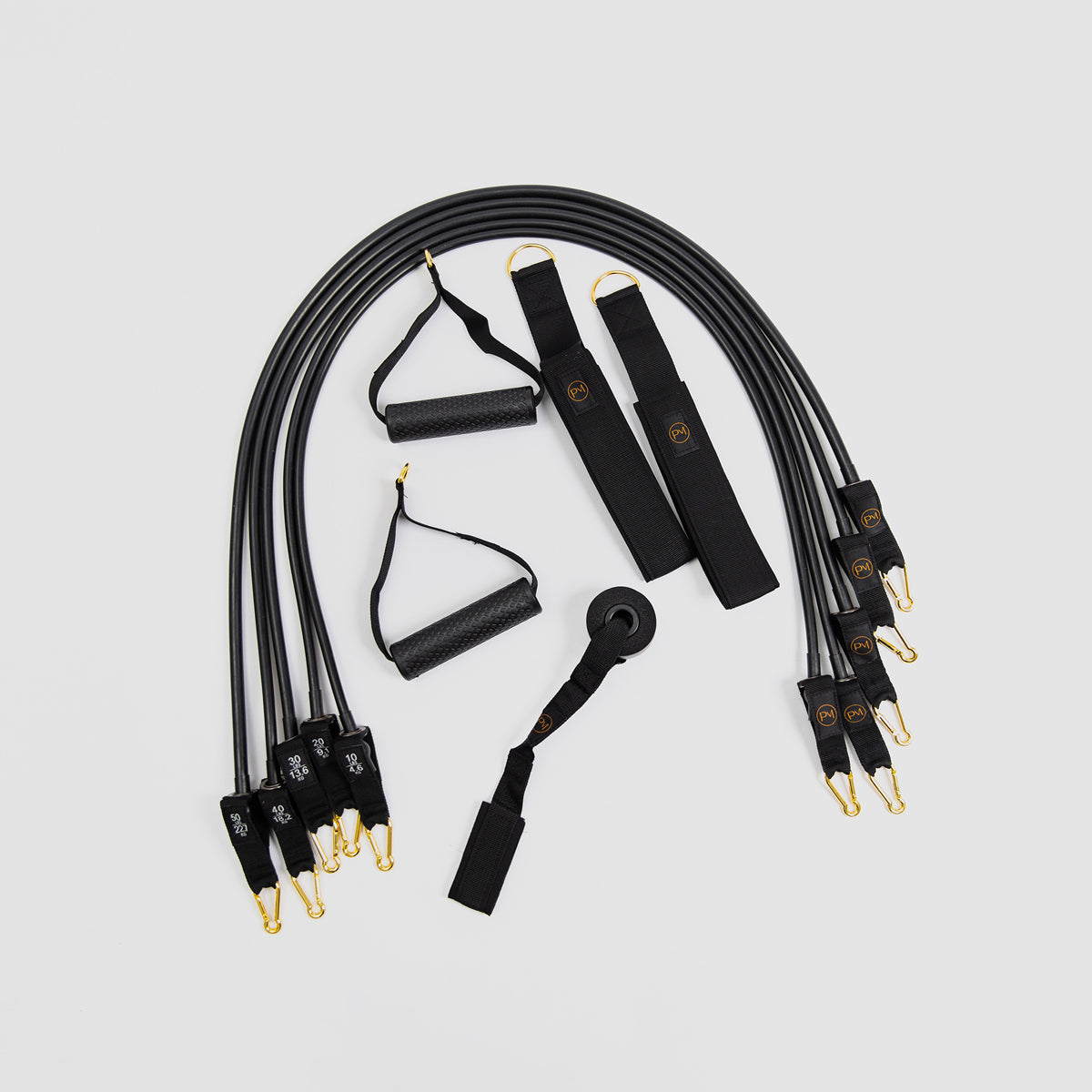 Set of black Pilates Mini resistance bands.